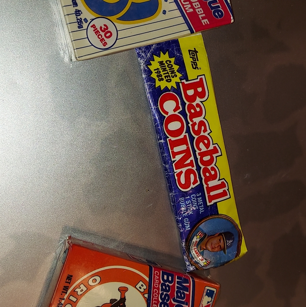 Never opened  baseball coins an two packs cards new